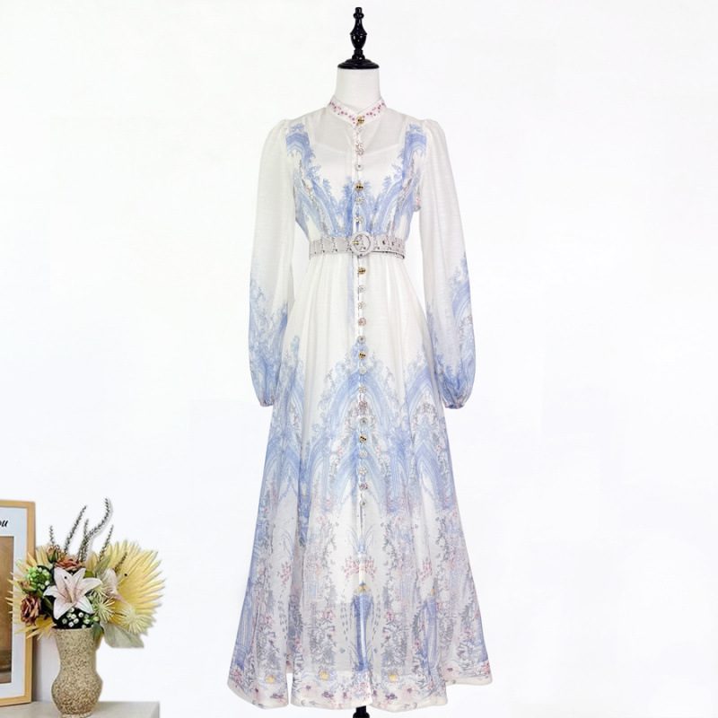 Robe col montant à simple boutonnage, manches bouffantes et taille cintrée